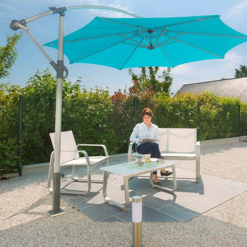 CANTILEVER UMBRELLA STAND Unobtrusive, you can anchor and reposition your large and small offset umbrella wherever you like (lawn, stabilized ground, flower bed, edge of patio or sloped ground).